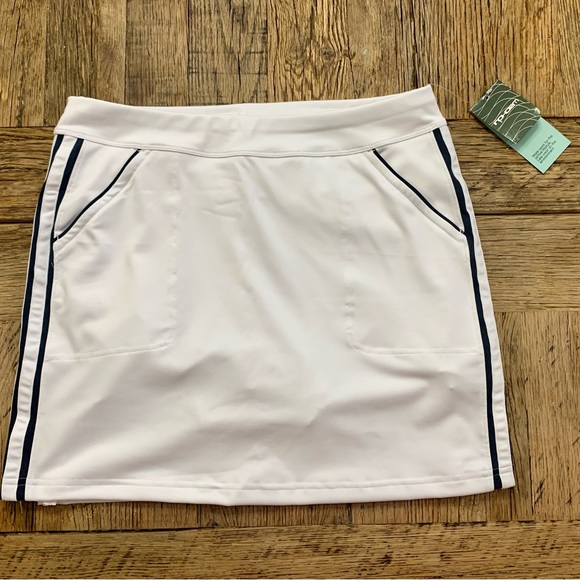 Brand new white Inphorm tennis skirt with pockets. Navy stripes down each side. - Picture 1 of 4